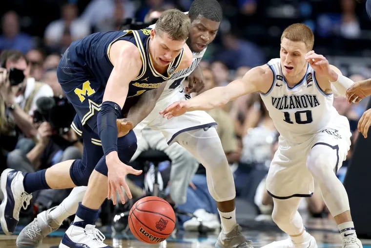 Moritz Wagner (left) scored 11 points in the early stages of the national championship game against Villanova, but ended with 16.