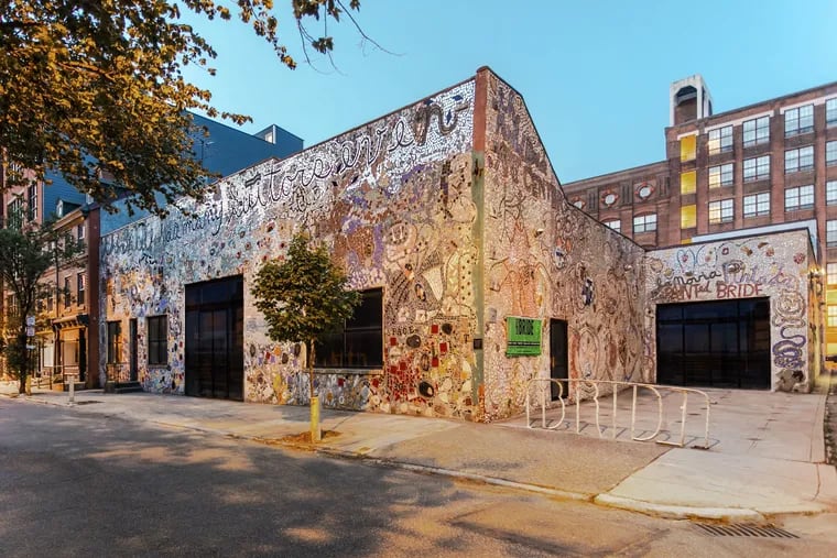 Working with Philadelphia's Magic Gardens, photographer Sarah R. Bloom captured this photo of the Painted Bride Art Center's signature Isaiah Zagar mosaic in June, after the black netting that had covered it for five years was removed.