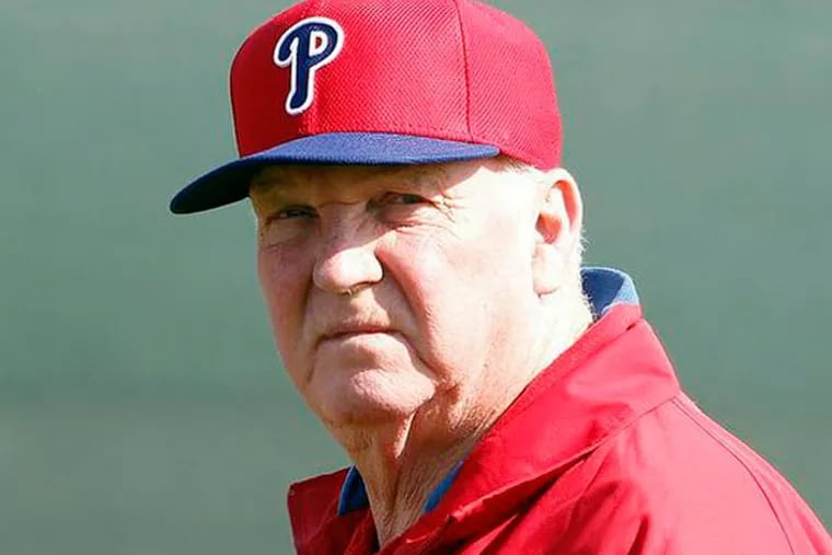 Phillies Manager Charlie Manuel watches his team during spring
training in Clearwater, FL on Saturday, February 16, 2013. (Yong Kim/Staff Photographer)