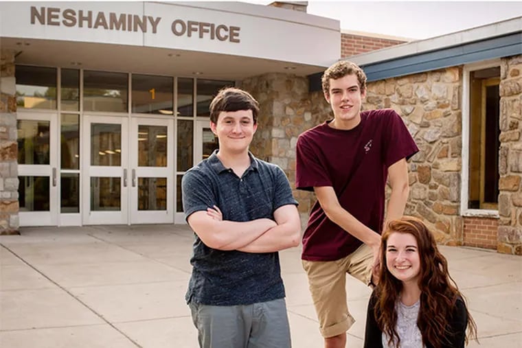 Neshaminy High School newspaper editors (from left) Reed Hennessy, Jackson Haines, and Gillian McGoldrick, all rising seniors, have fought use of the mascot's name in the paper.
