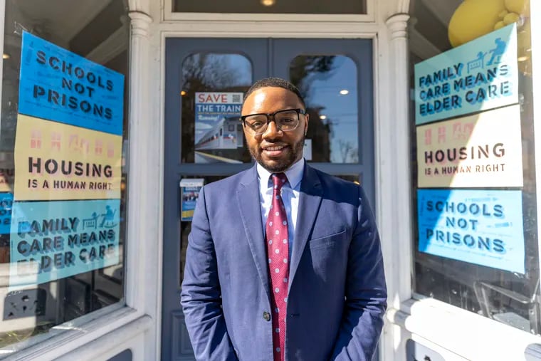 Democrat Andre Carroll, 33, of Germantown, Pa., running for state representative, poses for a portrait outside his campaign office in Germantown in Philadelphia, Pa., on Friday, March 22, 2024.