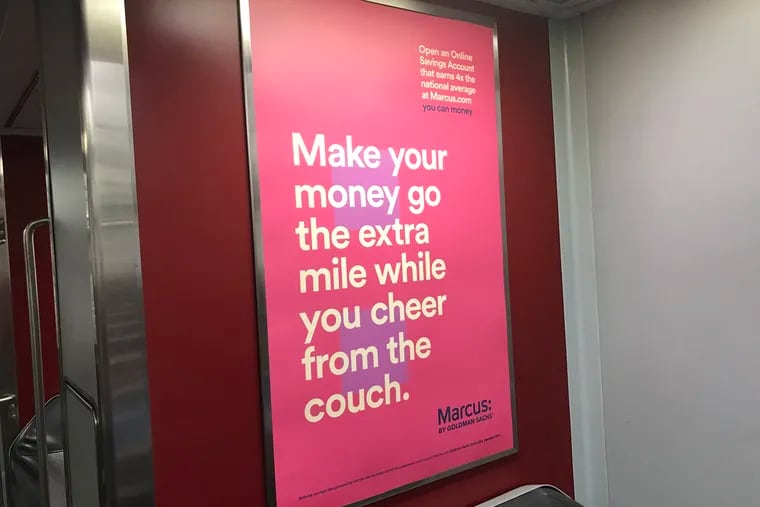 Advertisement on SEPTA regional rail trains for Marcus, Goldman Sachs' mass-market appeal to middle class investors, named for Marcus Goldman, who founded the firm in 1869.