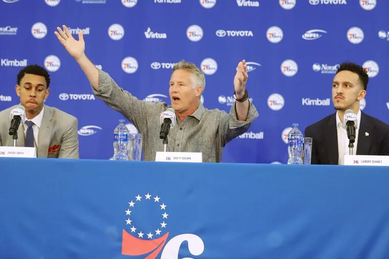 Sixers coach and interim general manager Brett Brown on Friday with first-round picks Zhaire Smith and Landry Shamet.