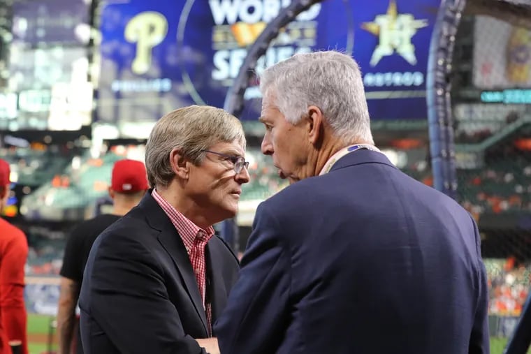Phillies managing partner John Middleton (left) and president of baseball operations Dave Dombrowski talk before Game 6 of the World Series in November.