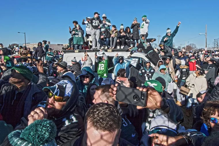 Fans await the Eagles&#039; arrival at Philadelphia International Airport on Monday after their victory in Super Bowl LII.