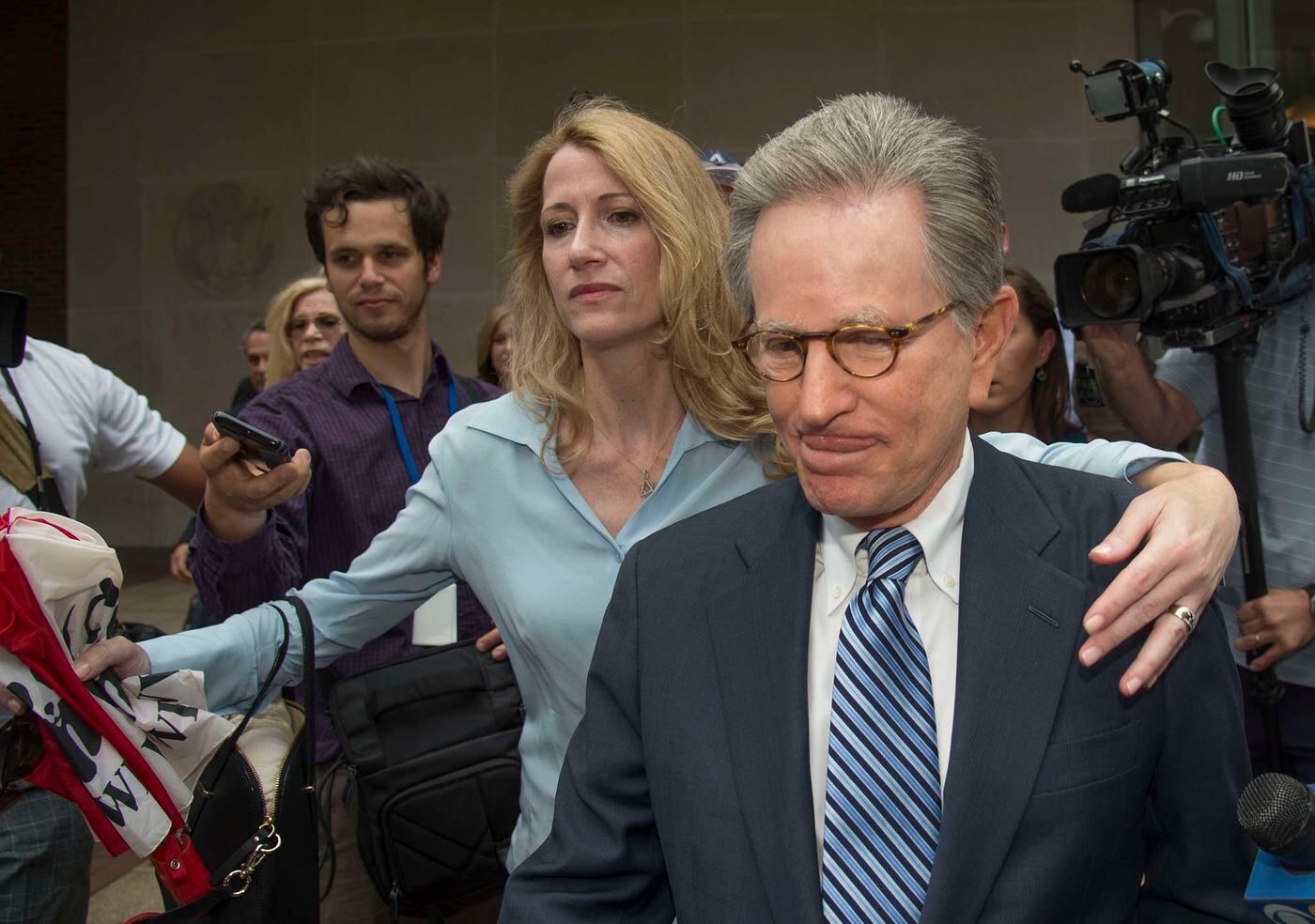 With niece Jaclyn Savitz clearing the way through the news media, Herbert Vederman, leaves Federal Court Tuesday, June 21, 2016 after being convicted, along with his friend U.S. Rep. Chaka Fattah, of racketeering.
