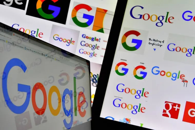 FILE photo shows logos of Google displayed on computers' screens.