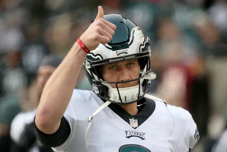 Eagles quarterback Nick Foles giving a thumbs-up on the sideline before Sunday's game against the Redskins.