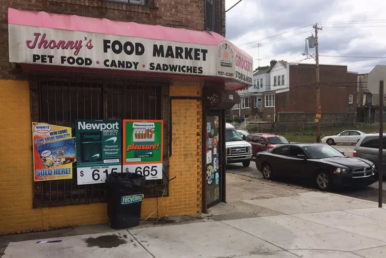 Jasmine Williams, who was eight months pregnant, was fatally shot outside of this Ogontz corner store yesterday morning. Another man was also wounded. (David Gambacorta / DAILY NEWS STAFF)