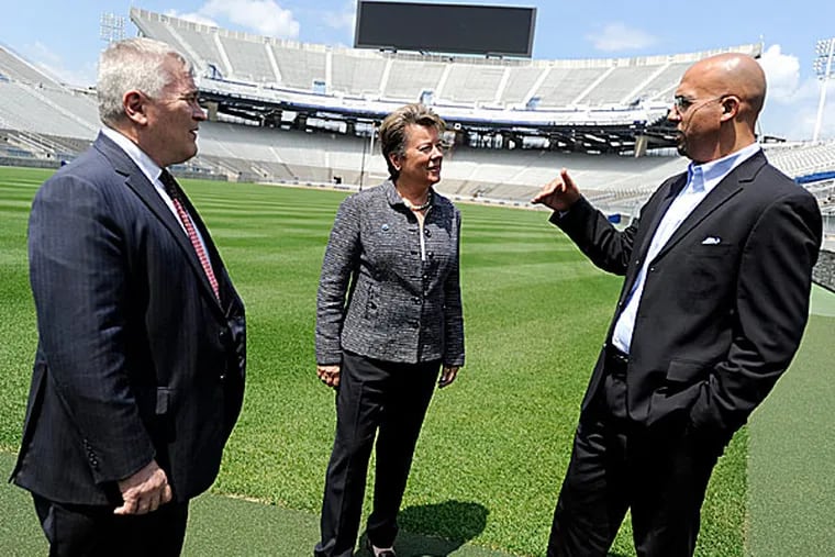 From left: Penn State President Eric Barron, athletic director Sandy Barbour and football coach James Franklin.