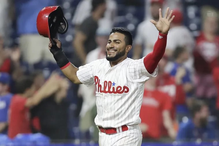 Phillies rookie utilityman Jesmuel Valentin celebrates after Trevor Plouffe's 16th-inning home run Tuesday night at Citizens Bank Park.