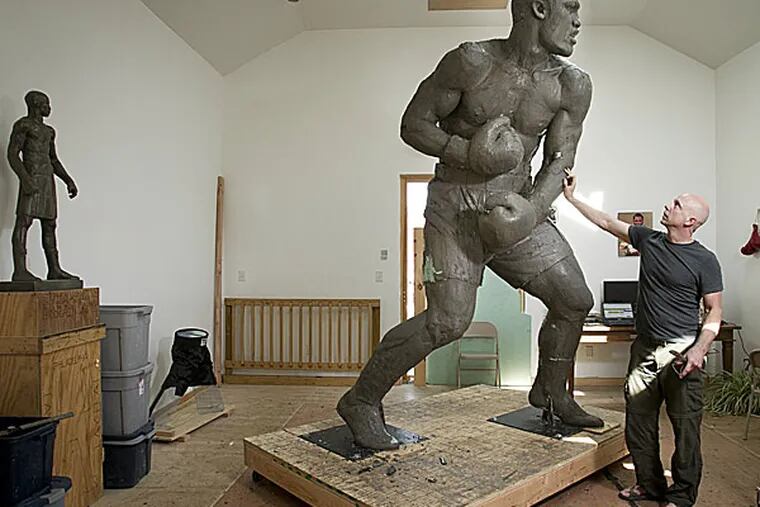 Sculptor Stephen Layne with his Joe Frazier statue. (Alejandro A. Alvarez/Staff Photographer)