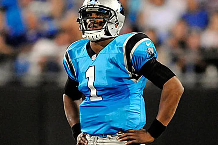 Panthers quarterback Cam Newton struggled Thursday night against the Giants. (Mike McCarn/AP)