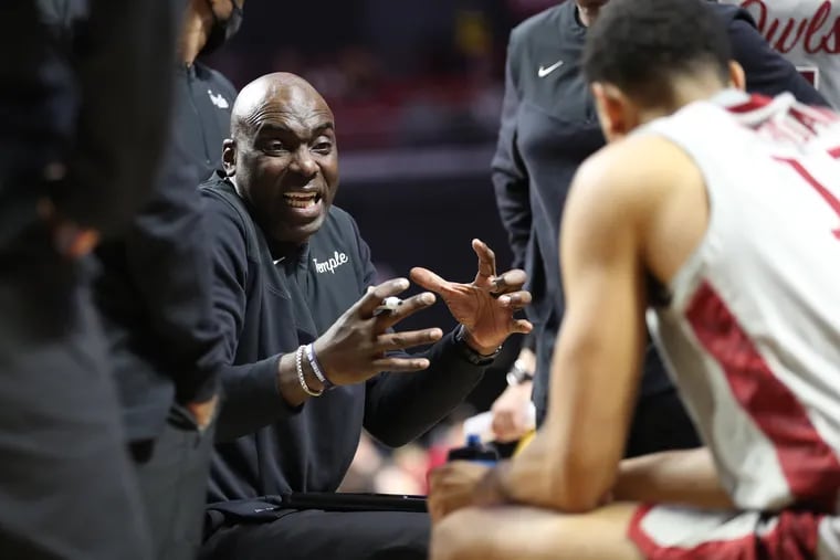 Temple coach Aaron McKie huddles with his team against USC during the second half at the Liacouras Center on Nov. 13, 2021.