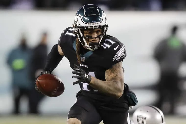 Eagles cornerback Ronald Darby intercepts a pass intended for Oakland receiver Amari Cooper late in the fourth quarter in the game at Lincoln Financial Field on Monday. The Eagles won, 19-10.