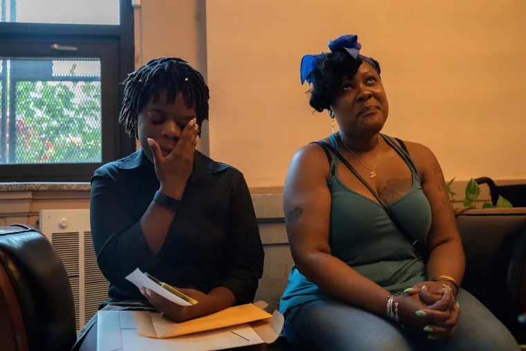 Karisha Quashie (left), 23, and her Aunt Marla Phyars, 52, tear up as they talk about Gregory Samuel, Karisha's father, inside Francis Funeral Home in Southwest Philadelphia on Friday, June 28, 2019. Funeral services for Samuel, who died from injuries suffered while trying to protect his mother, will take place Friday, July 5, 2019.