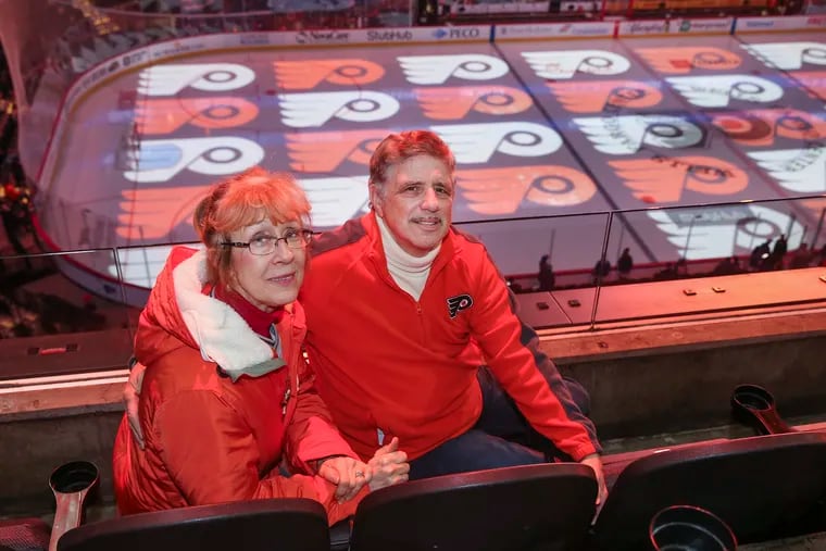 Bob Artese and his wife, Alexis, are rabid Flyers fans. They are shown here at the Wells Fargo Center before a game against the Rangers on Feb. 28, 2020.
