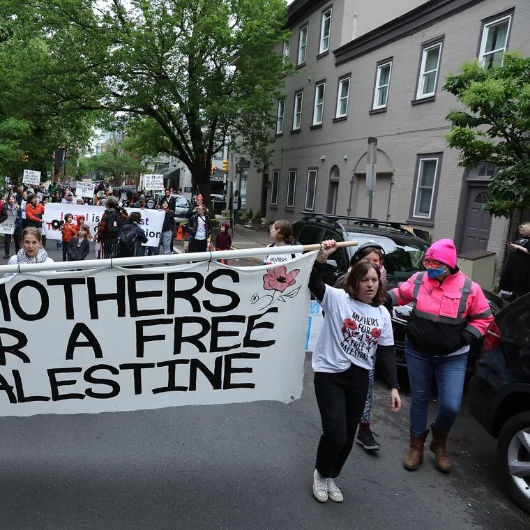 The group of mothers protesting the Israel-Palestine war on Mother's Day marches toward Rittenhouse Square.