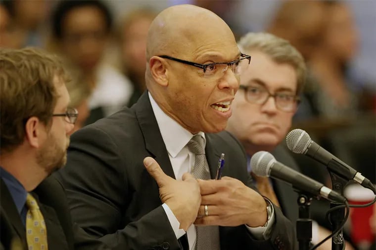 Philadelphia School Superintendent William Hite, center, flanked by CFO Matt Stanski, left, and SRC President William Green, right, pleads his case to City Council President Darrell Clarke and Coucil Woman Jannie Blackwell Monday morning.