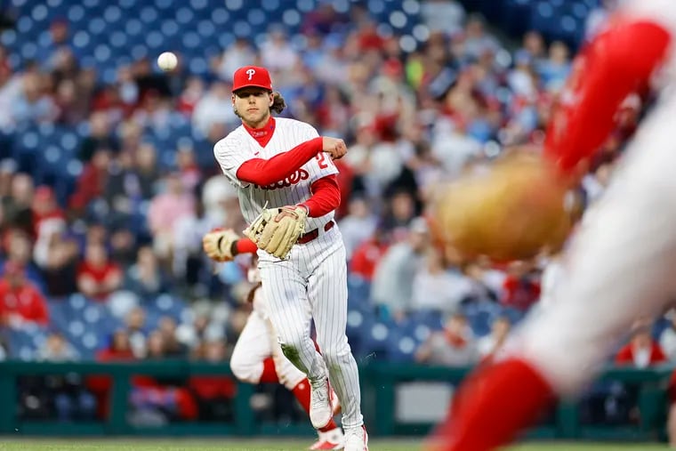 Phillies third baseman Alec Bohm throws out New York Mets Starling Marte in the second inning on Monday, April 11, 2022 in Philadelphia.