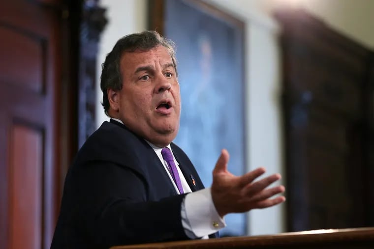 Gov. Chris Christie reacts to a question from the media after he announced that more than 500,000 New Jersey residents now have health insurance coverage under Medicaid as part of the expansion under the Affordable Care Act Monday, Aug. 29, in Trenton, N.J.