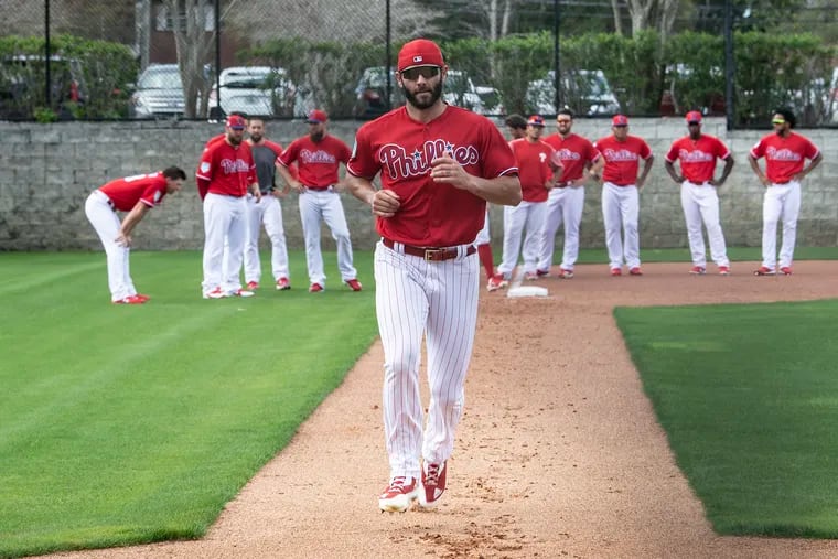 Jake Arrieta runs the bases during spring training -- in his uniform, not a Speedo.