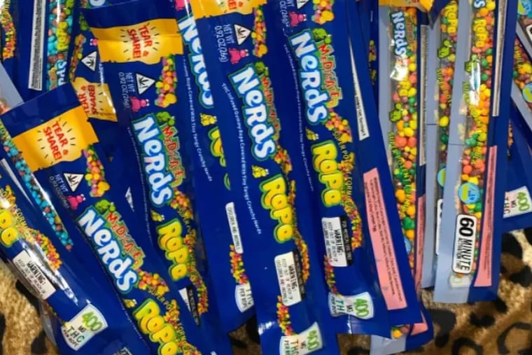 Counterfeit packaging holds illicit THC-infused Nerds Rope. The packaging is sold openly on Amazon. The dosed candy is also sold on Instagram and by underground dealers.