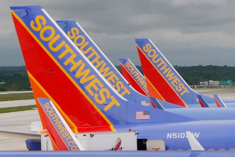 Southwest Airlines jets parked at their gates at Baltimore Washington International Airport in Baltimore.
