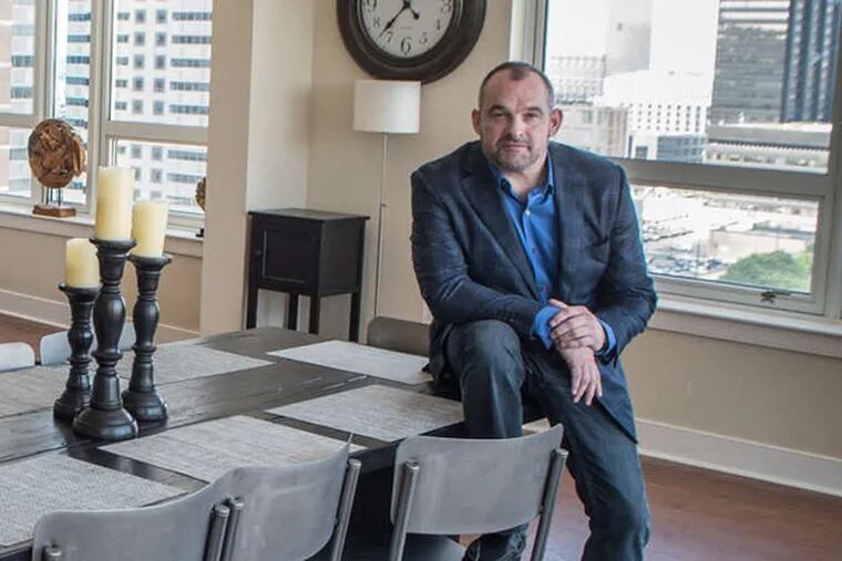 Steve Patterson runs UrHomeInPhilly, a service that rents high-end apartments to business people in Philadelphia for long-term stays. ( MATTHEW HALL / For The Inquirer )