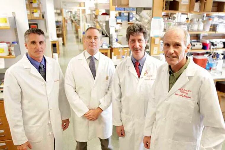 Doctors ( left to right ) David Porter, Michael Kalos, Bruce Levine and Carl June converse in the research labs.  ( David Swanson / Staff Photographer ) Hospital of University of Pennsylvania, 431 Curie Blvd., Philadelphia, PA 19073 08-09-11 HE1GENE11 Another coup, the biggest yet, for University of Pennsylvania gene therapists led by Carl June: an experimental gene therapy completely eradicated a chronic form of leukemia in two patients. They're still in remission almost a year later. A third patient had a dramatic reduction in his blood cancer. The story will explain the 20 years of science behind this feat, which is being published simultaneously in two premier journals -- New England Journal of Medicine and Science Translational Medicine. Although the patients have declined to be identified/interviewed, one has written an eloquent essay that provides his view. NOTE: The embargo is 2 pm Wed, so this can go online before print on Thursday. Reporter is is Marie McCullough. (5)