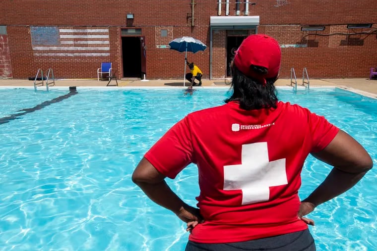 Life Guard instructor Thelma Nesbitt (foreground) and Will Coleman at Samuel Recreation Center, 3539 Gaul St., last month. This was the lone training pool for lifeguards this year.