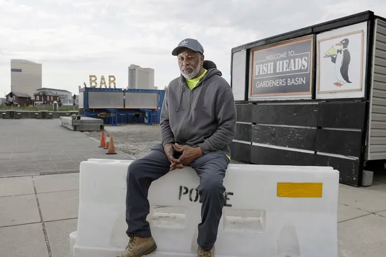 Gregory “Dredgie” Wood and his Fishheads food truck (right) at Gardner's Basin in Atlantic City, N.J. on May 4, 2022.