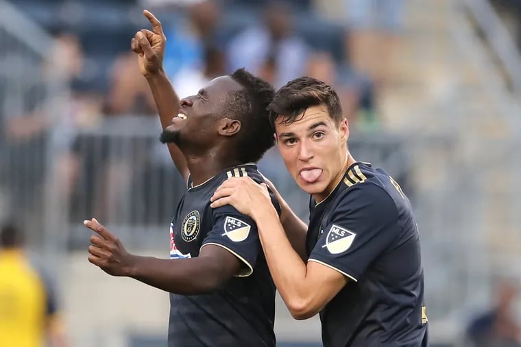 David Accam (left) celebrates with Anthony Fontana after scoring his first goal for the Philadelphia Union, in their rout of the Richmond Kickers in the U.S. Open Cup. 