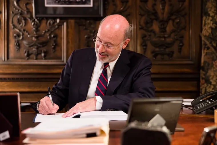 Gov. Wolf signs the state budget.