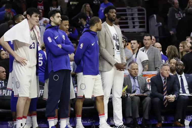 The Sixers bench watching the end of their 113-103 loss to Miami in Game 2.