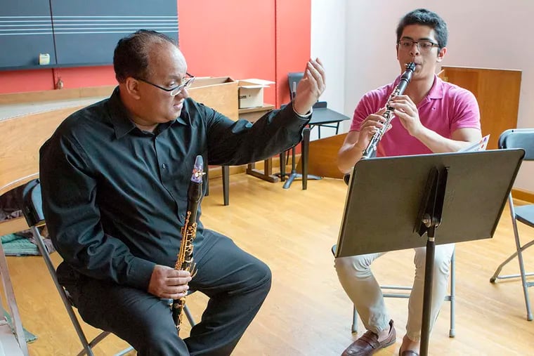 Ricardo Morales, principal clarinetist of the Philadelphia Orchestra, leads a master class with NYO2's Mikhail Marasigan.