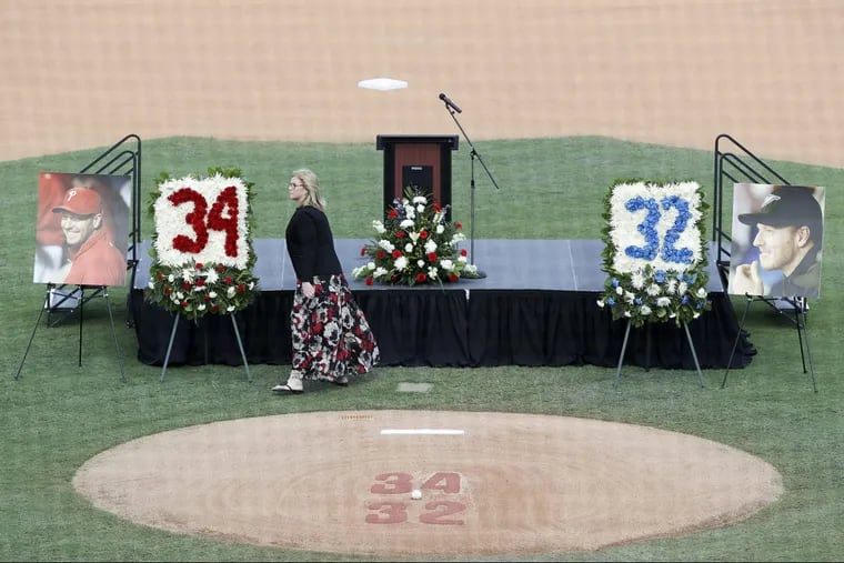 Philadelphia Phillies Vice President of Communications Bonnie Clark walks near the stage before the start of a celebration of life for former MLB pitcher Roy Halladay at Spectrum Field in Clearwater, Fla., on November 14.