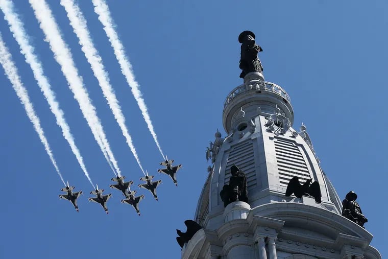 The U.S. Air Force Thunderbirds (pictured) and U.S. Navy Blue Angels flight demonstration squads perform a flyover in honor of health care workers across City Hall in Philadelphia on Tuesday, April 28, 2020.