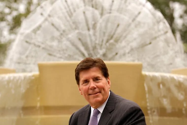 American Water CEO Don Correll poses by a fountain outside their corporate offices. (Tom Gralish / Staff Photographer)