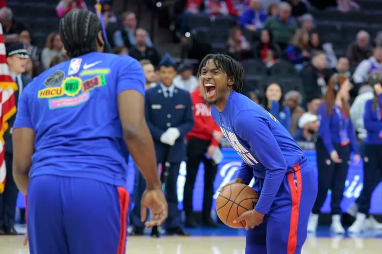 James Harden (left) and Tyrese Maxey of the Sixers share a laugh as they warm up before their game against the Rockets during the first half of their game at the Wells Fargo Center on Feb. 13, 2023.