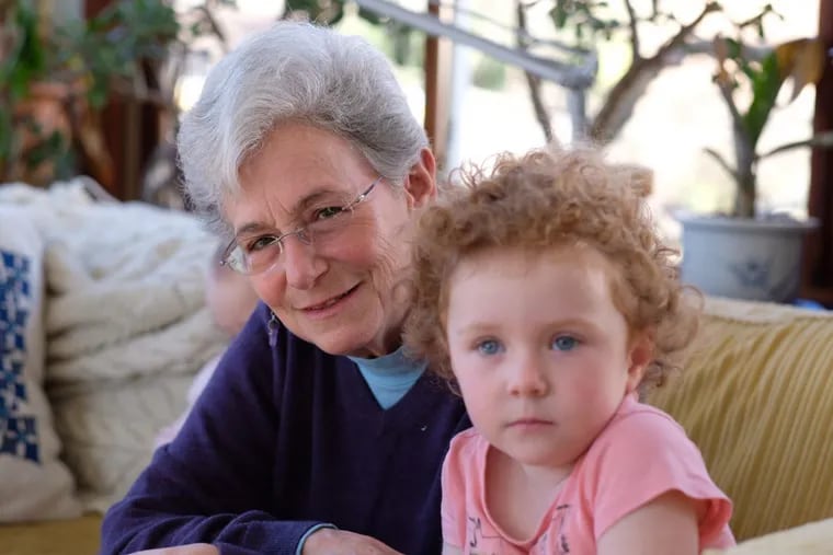 Judy Politzer pictured on her sun porch with her granddaughter Abby as she talks about her ongoing healthcare billing issues.