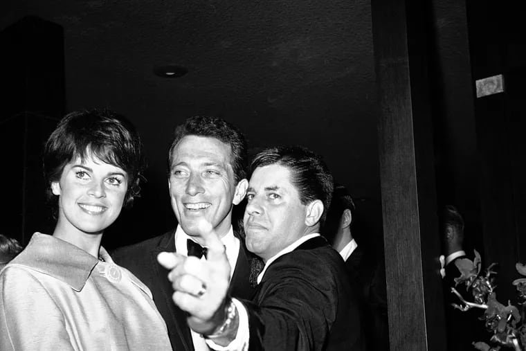 On hand for the grand opening party at the $750,000 Jerry Lewis Restaurant in Hollywood?s Sunset strip, Los Angeles, Feb. 15, 1962, left to right are Singer Andy Williams and bride Claudine Longet with Jerry Lewis. (AP Photo/Harold Matosian)