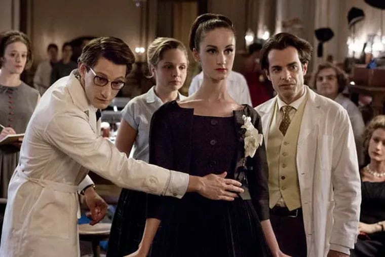 Pierre Niney (left) stars as Yves Saint Laurent in the new film about the designer's life from the 1950s to the mid-1970s.