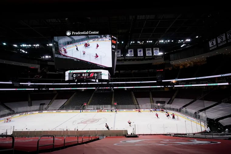 The Philadelphia Flyers play the New Jersey Devils at a nearly empty Prudential Center.