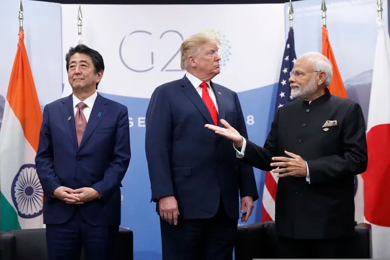President Donald Trump meets with India's Prime Minister Narendra Modi, right, and Japan's Prime Minister Shinzo Abe, Friday, Nov. 30, 2018 in Buenos Aires, Argentina. (AP Photo/Pablo Martinez Monsivais)