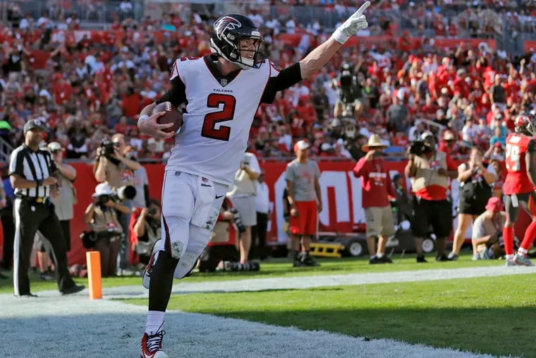 Atlanta Falcons quarterback Matt Ryan (2) celebrates after catching a 5-yard touchdown pass from Mohamed Sanu during the second half of a game against the Tampa Bay Buccaneers on Dec. 30. Ryan, a graduate of Philadelphia's William Penn Charter School, where he captained the football, basketball, and baseball teams, inspired a storyline in Wednesday, Jan. 9, series premiere of ABC's Philly-set comedy "Schooled."