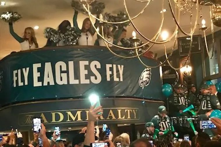 Eagles cheerleaders at Admiralty Pub in London's Trafalgar Square on Thursday, Oct. 25, 2018. LES BOWEN / Staff