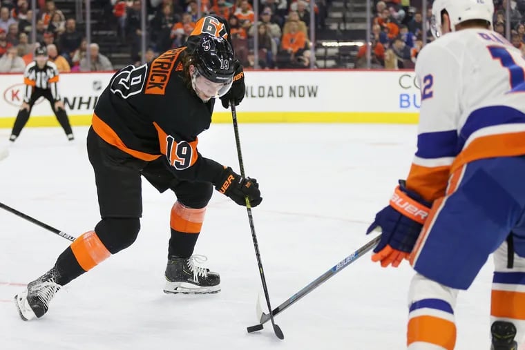 The Flyers' Nolan Patrick, shown battling the New York Islanders' Josh Bailey for the puck in a game last season, could be a part of the team's practices on a full-time basis next week.