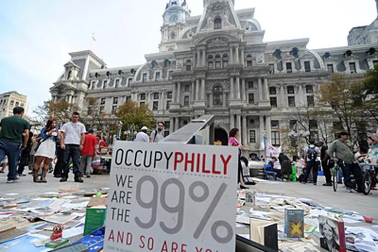 On a sunnier day, the Occupy Philly protest outside City Hall in Dilworth Plaza.  October 10, 2011   (SARAH J. GLOVER / STAFF PHOTOGRAPHER)