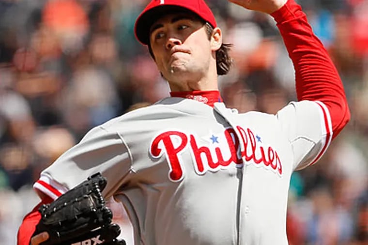 Cole Hamels allowed four runs on nine hits over six innings on Tuesday. (Eric Risberg/AP)